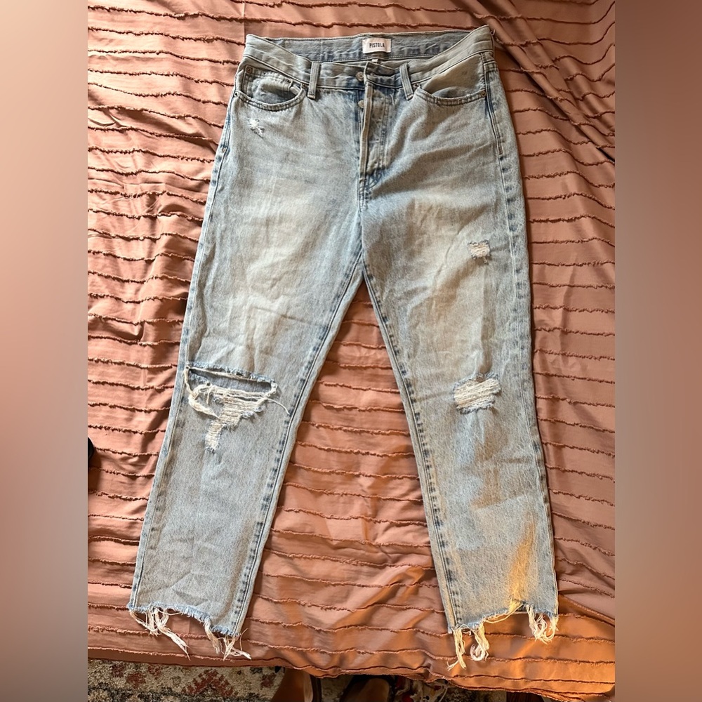 - Pistola jeans